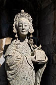 Bangkok Wat Arun - Details of the statues of Chinese saints of the pagoda at the corners of the Ubosot coutyard. 